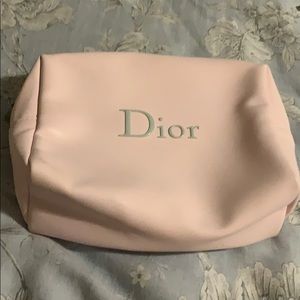 Pink Dior makeup bag